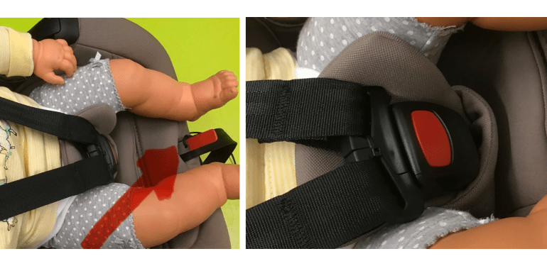 Een pop in een maxi cosi autostoeltje met een rode pijl om een ijzeren pinnetje aan te wijzen. En gebruik tiewraps om de bandjes vast te zetten.