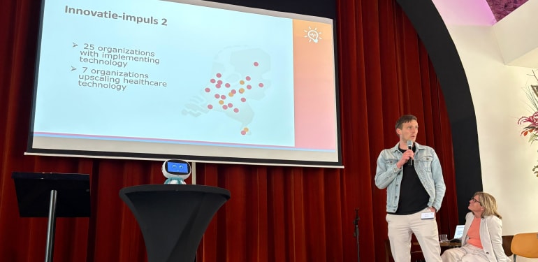 Wouter Vos geeft presentatie over Innovatie-impuls 2.